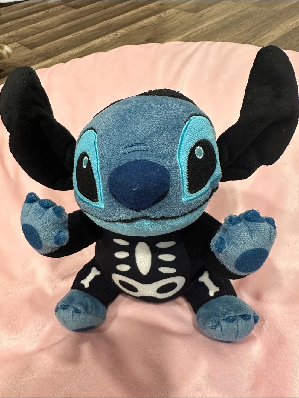 Blue and Black Stitch-Style Plush Toy with Skeleton Design